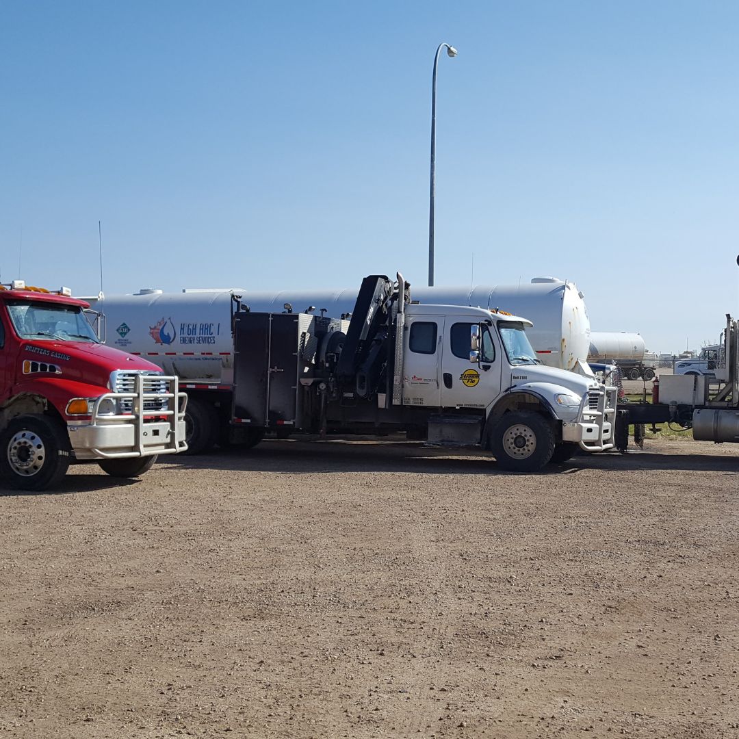 Trucks and Trailers Getting Serviced